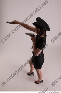 14 NIKITA POLICEWOMAN STANDING POSE WITH TWO GUNS